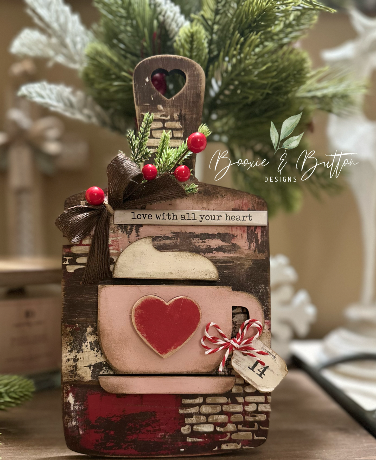 Cutting board with hot cocoa and spoon