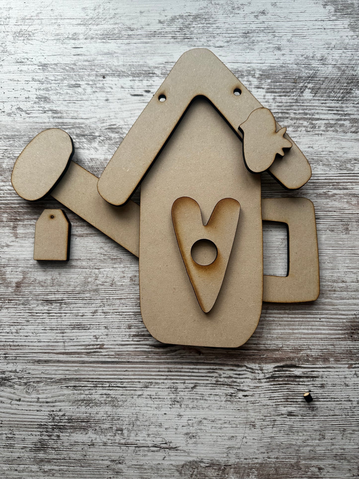 Watering can birdhouse