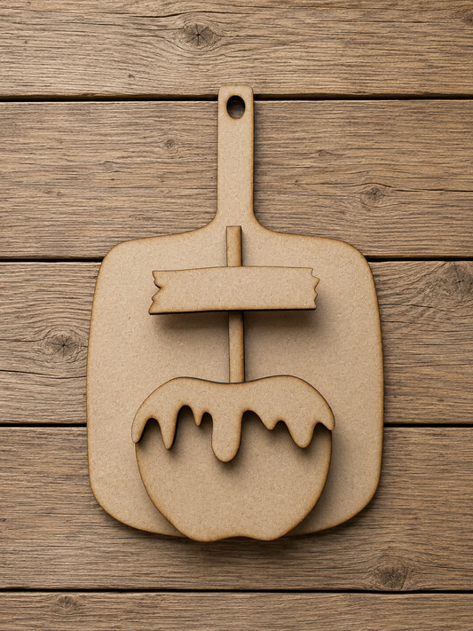 Caramel apple with board