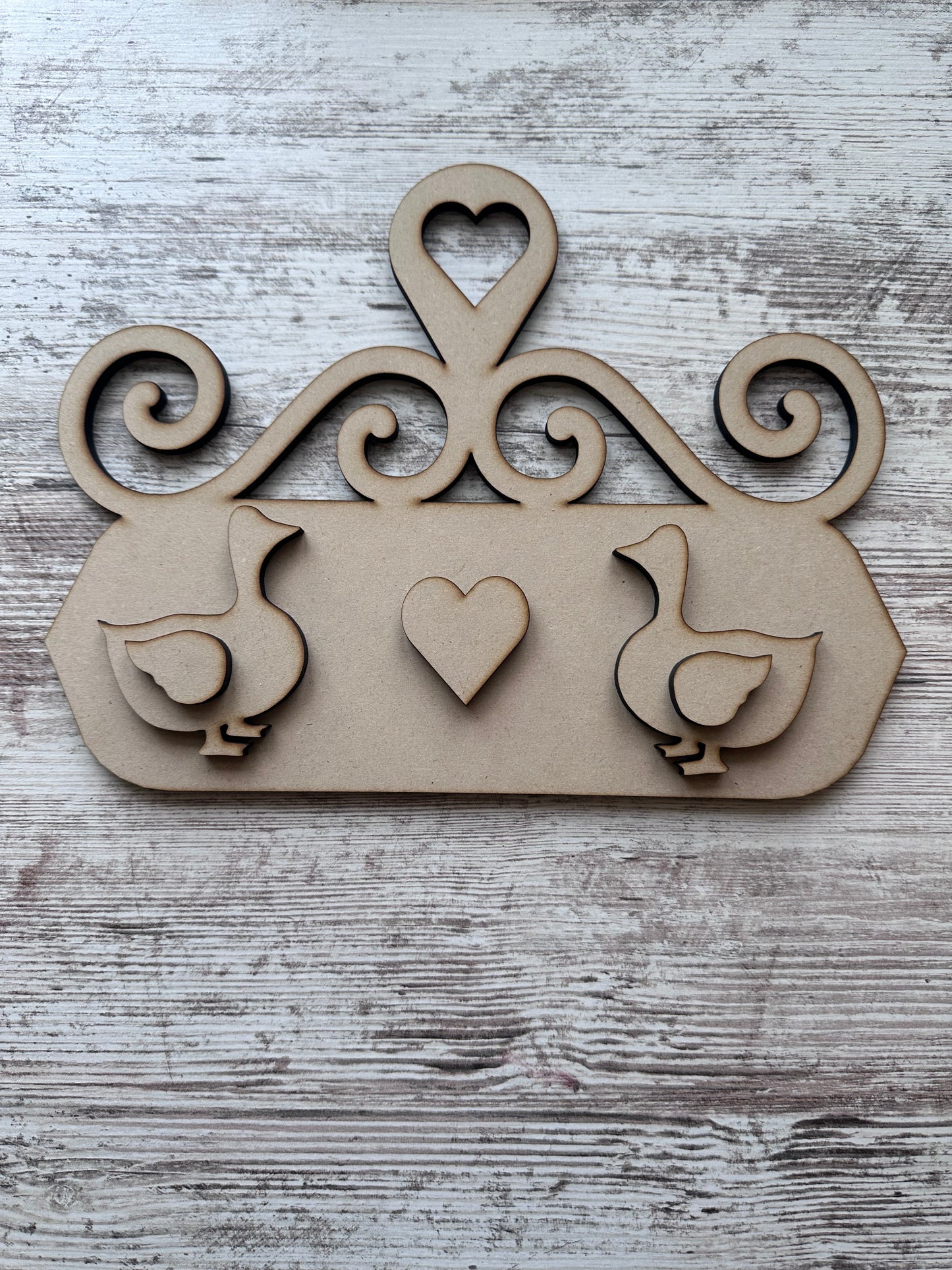Decorative wall hanger with geese