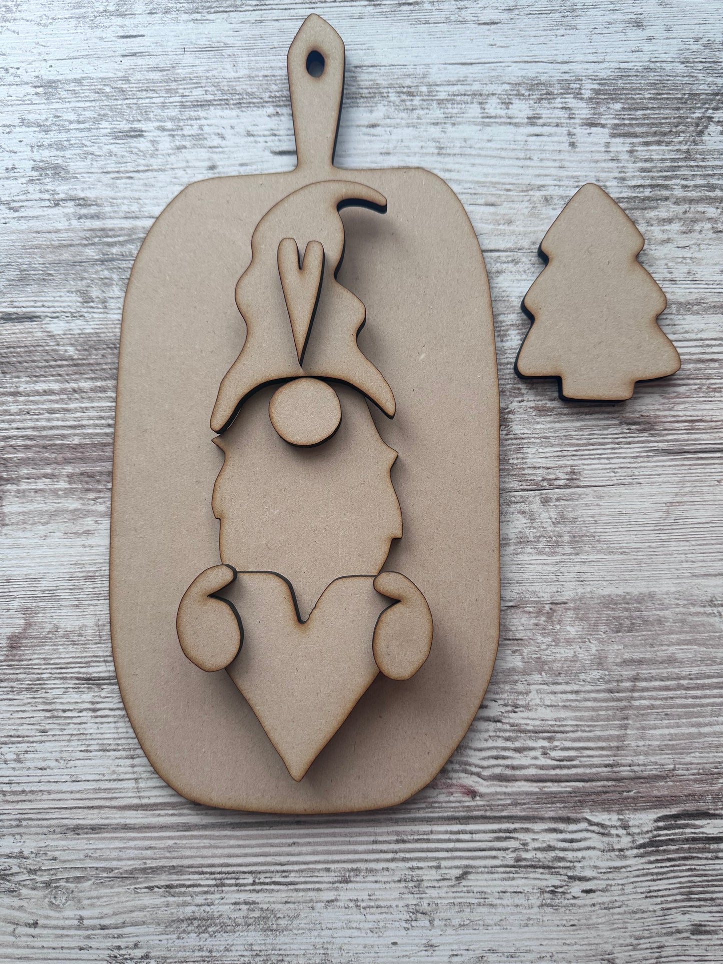 Winter gnome with board